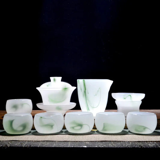 Light luxury high-end loure kung fu tea set, suitable for household, living room, office meeting and gift-giving, with jade porcelain tea cups and gift box